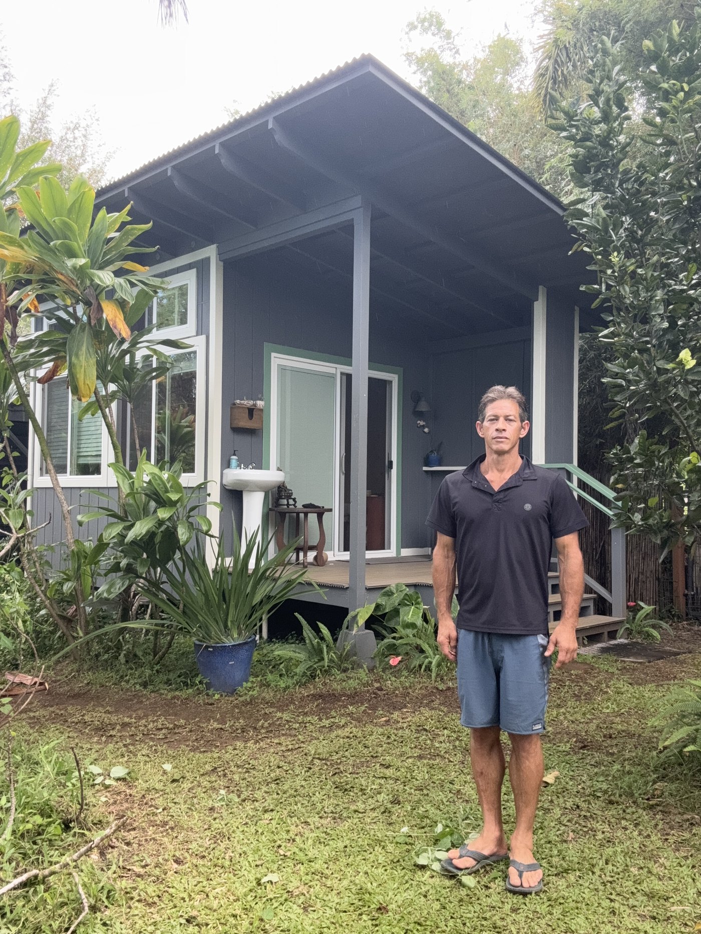 Armando Luis Rivas outside his bodywork studio on the Big Island of Hawai'i